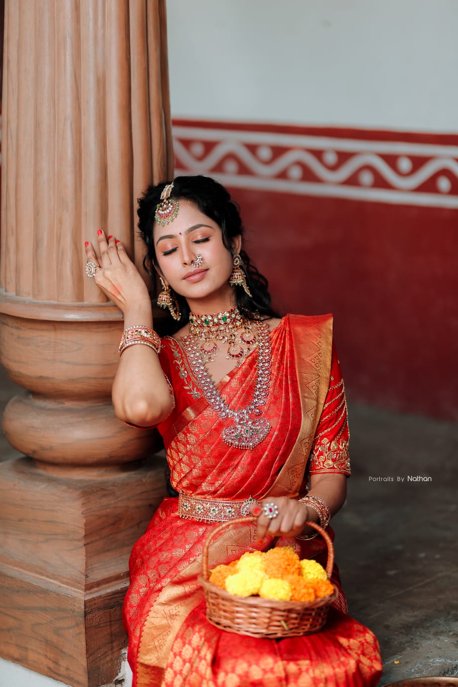 Gayu Sri in red saree collaboration look